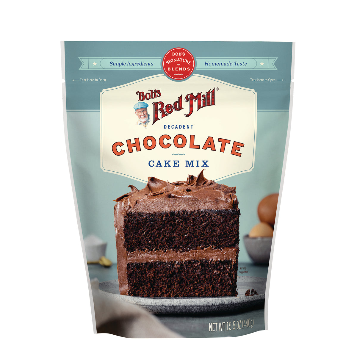 BOB483 | Bob's Red Mill decadent chocolate cake mix front pouch with a two-layer frosted chocolate cake slice