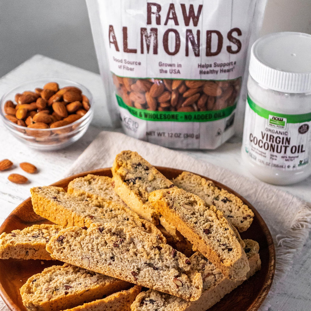 NWF927 | Biscotti slices served with raw almonds and virgin coconut oil in the background - Thumbnail