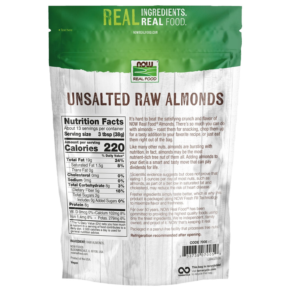 NWF927 | raw almonds spilling from open brown bag on wooden surface - Thumbnail