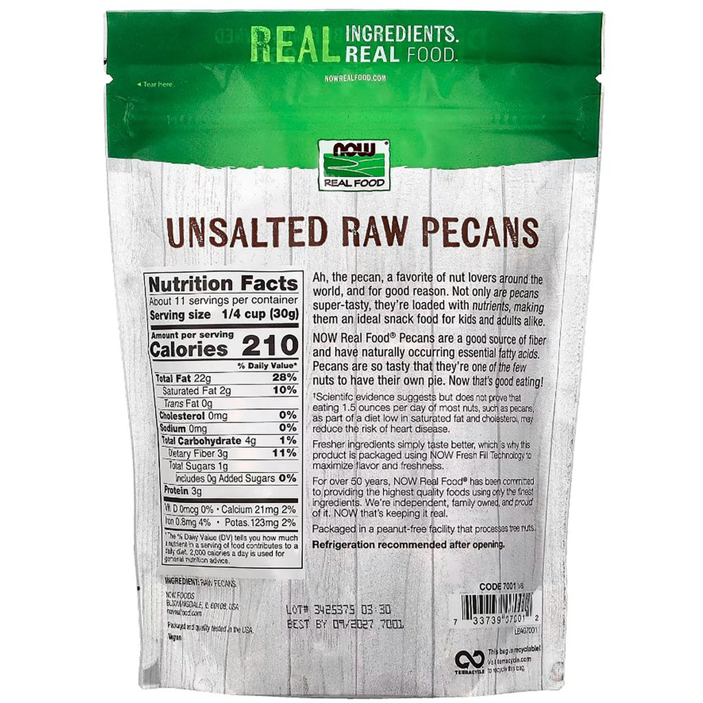 NWF1179 | shelled pecans scattered on a wooden cutting board with the product pouch blurred in the background - Thumbnail