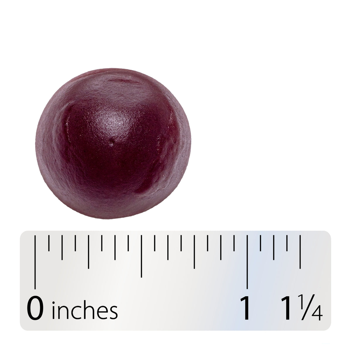 NW1059 | Purple spherical pellet beside ruler showing 1 1/4 inches