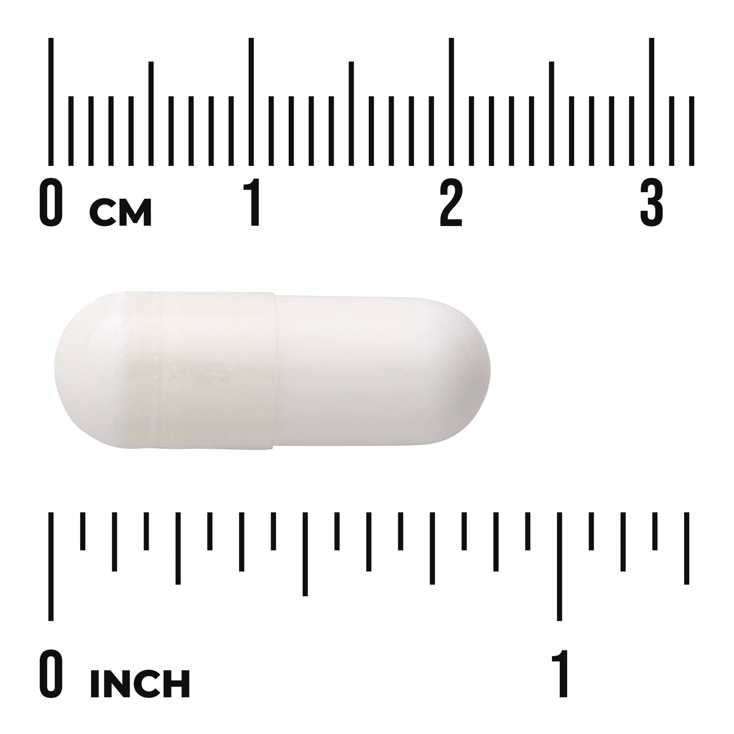 SWU797 | White capsule photographed on white background with centimeter and inch rulers for size reference