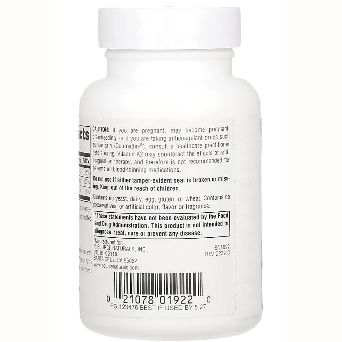 SN142 | back label of white supplement bottle showing caution text, barcode, and manufacturing information