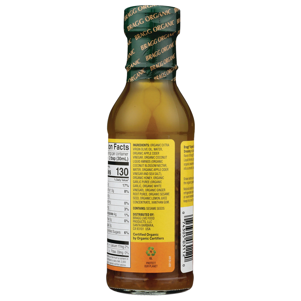 BR015 | Back of glass dressing bottle showing nutrition facts, ingredients panel and barcode