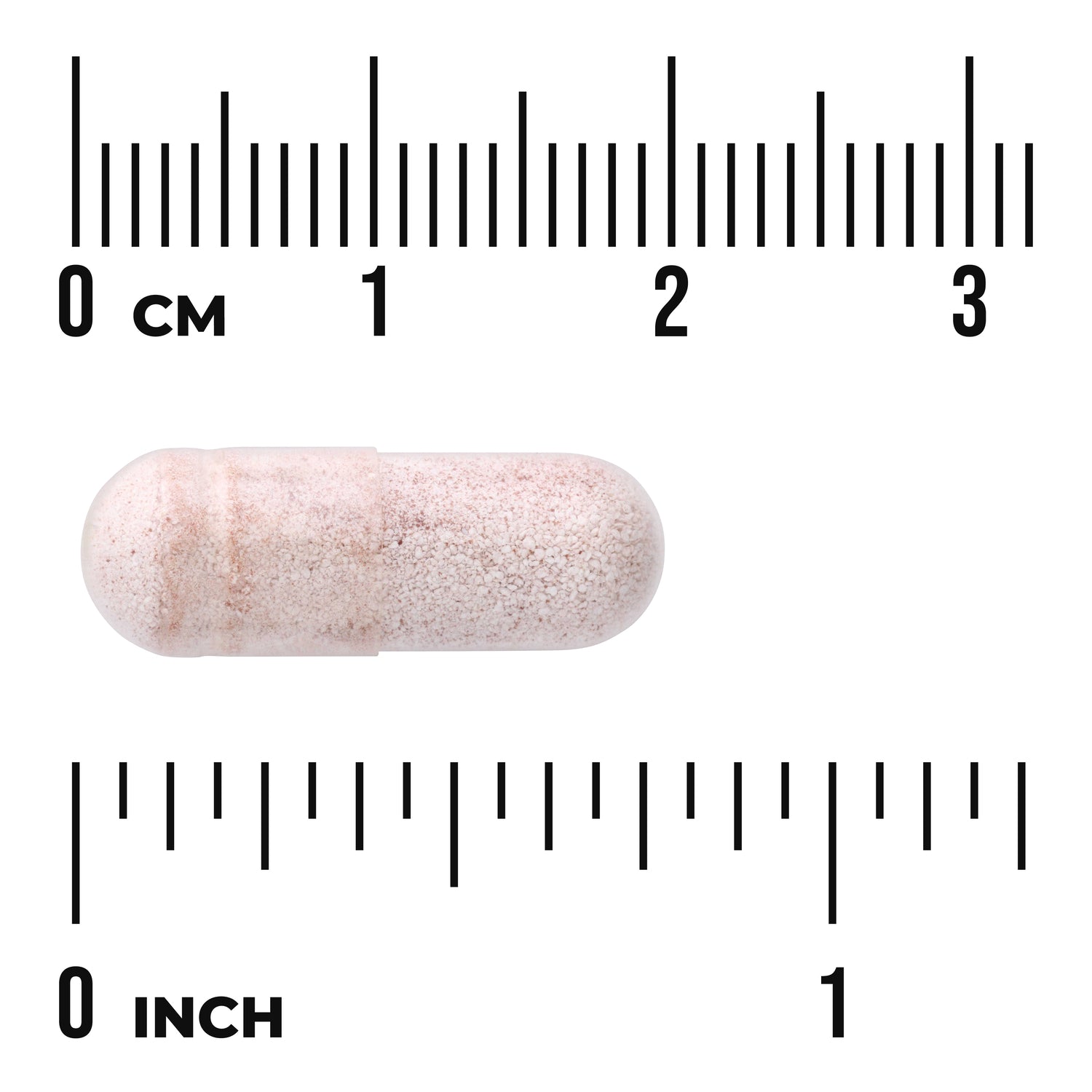 SWR053 | Pink capsule with size reference, shown against centimeter and inch rulers