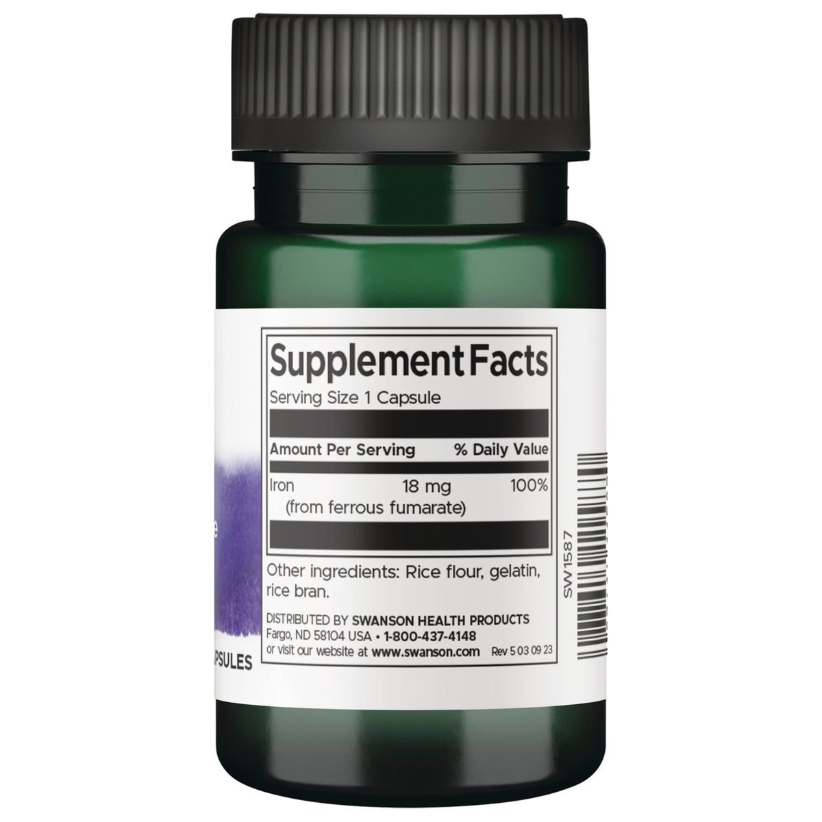 SW1587 | Clear capsule filled with brown speckled powder next to rulers labeled 0 cm and 0 inch