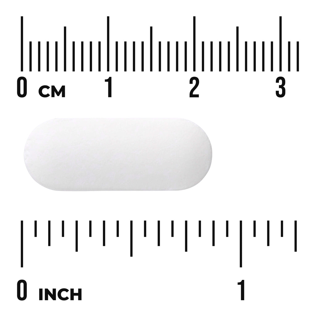 SW1364 | White oblong tablet on rulers labeled CM and INCH showing about 2.5 cm (1 inch) length - Thumbnail