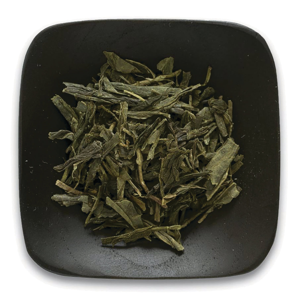 FNP084 | loose green tea leaves on a square black dish, top-down view