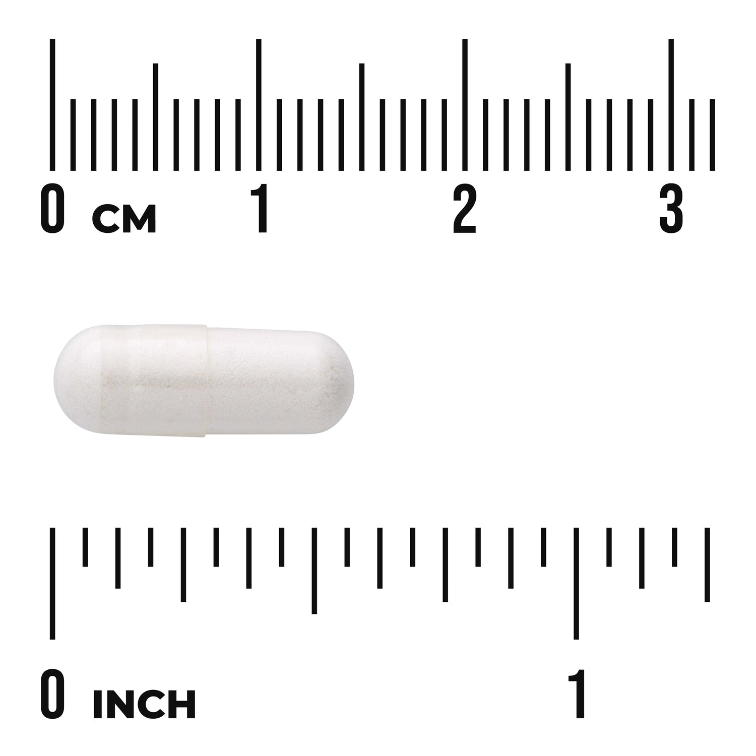 SW1733 | White capsule with cm and inch rulers showing approximate size