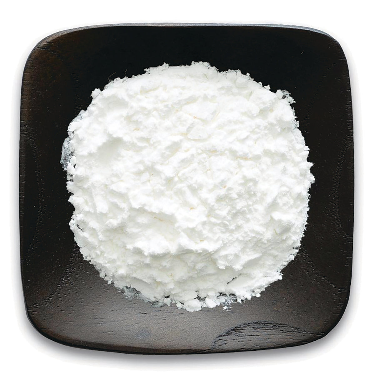 FNP180 | white powder piled on a dark square plate, top-down product shot