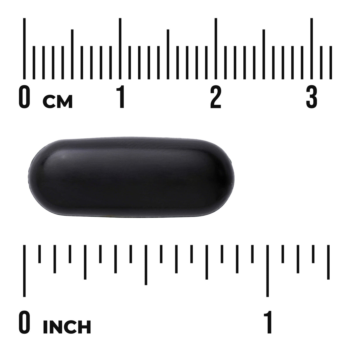 SW1857 | Black oblong softgel capsule on centimeter and inch rulers showing '0 cm' and '0 inch' markings
