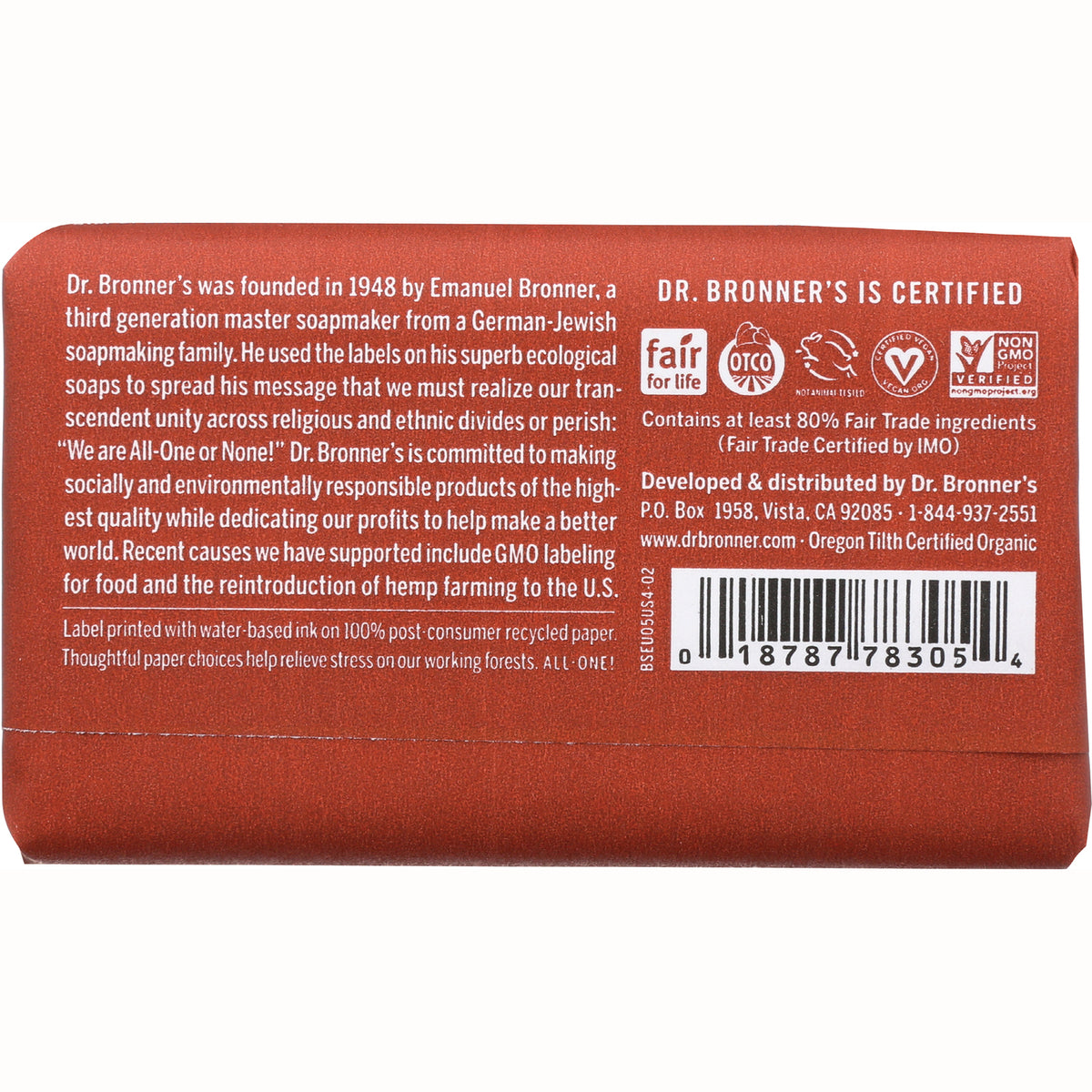 DRB002 | Back of red Dr. Bronner's soap wrapper with product history text, certification logos and barcode