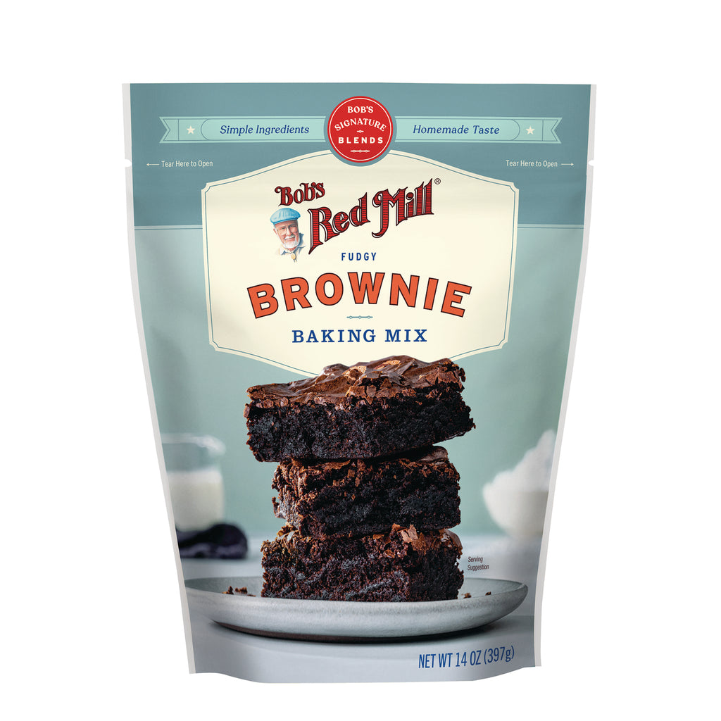 BOB479 | Bob's Red Mill fudgy brownie baking mix pouch with a stack of three brownies on a plate - Thumbnail