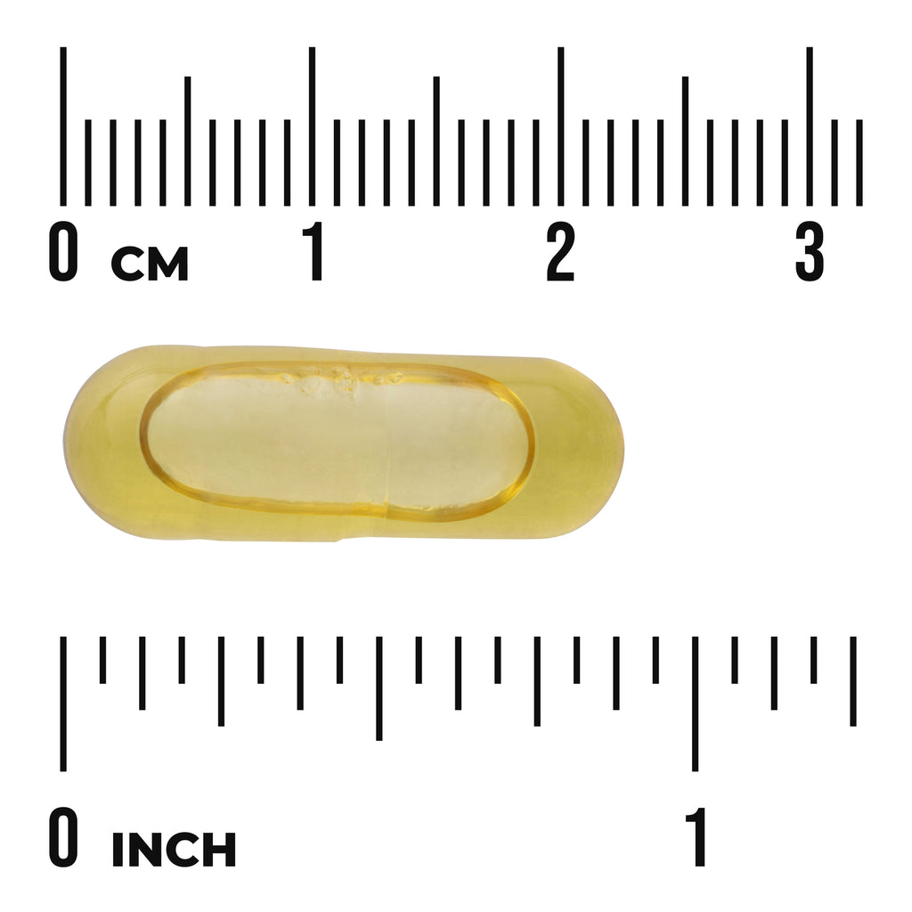 SWE063 | Yellow softgel capsule between centimeter and inch rulers showing 0 cm and 0 inch for size reference - Thumbnail