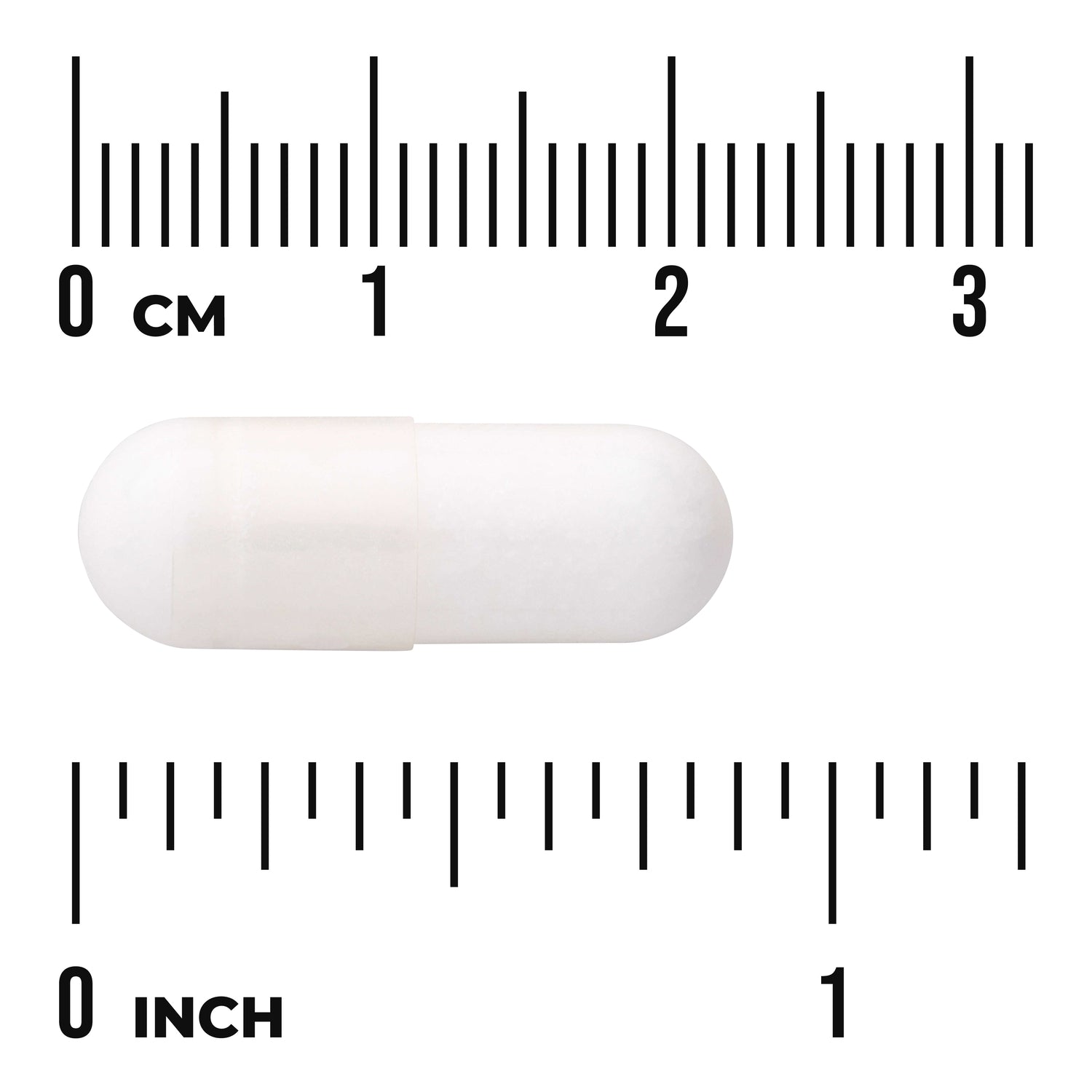 SWU799 | White capsule on centimeter and inch rulers showing pill size