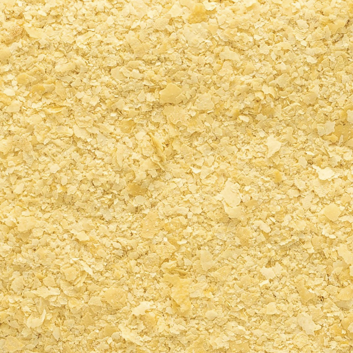 FNP021 | close-up of pale yellow flakes and fine crumbs