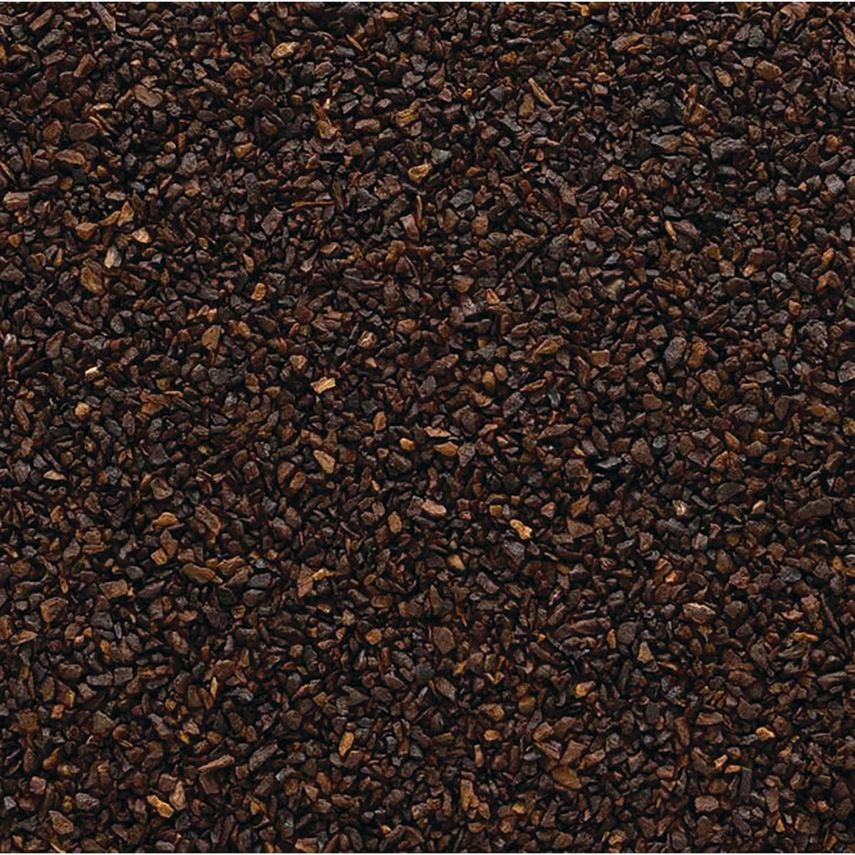 FNP385 | close-up of dark brown loose granules texture