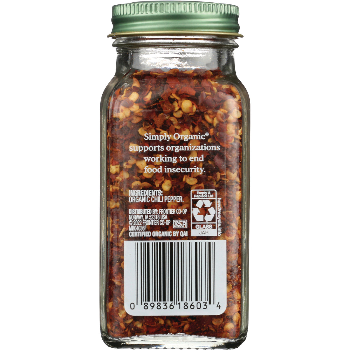 SMP065 | Back label with barcode, recycling info, and ingredients: Organic chili pepper; Simply Organic message about food insecurity