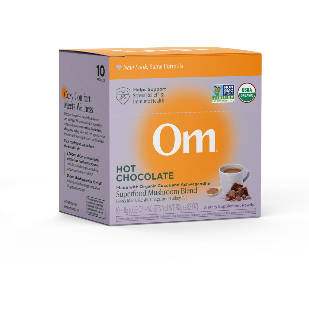 MMX038 | Om Mushroom Superfood hot chocolate blend purple box labeled Mushroom Hot Chocolate Blend, 10 packs, Focus Immunity De-Stress - Thumbnail