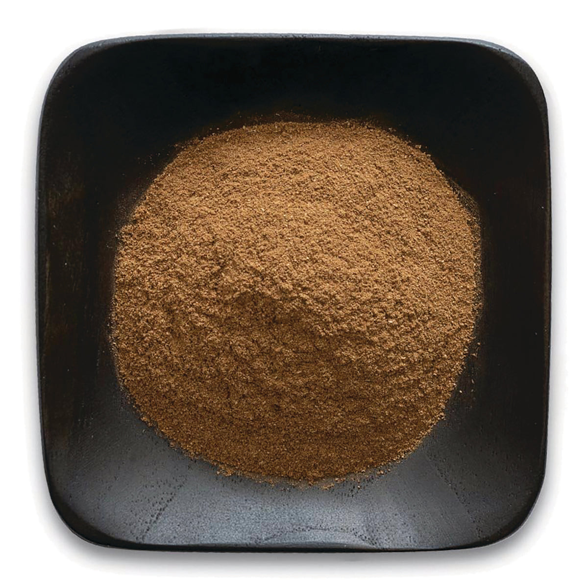FNP063 | top-down view of fine brown powder piled in a square black dish