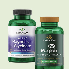 Two Swanson brand supplement bottles on a light green background
