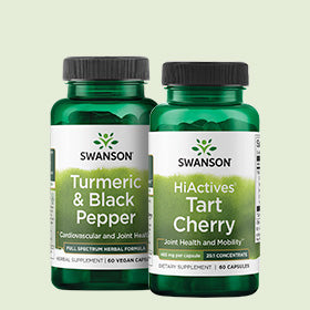 Two Swanson supplement bottles on a light green background