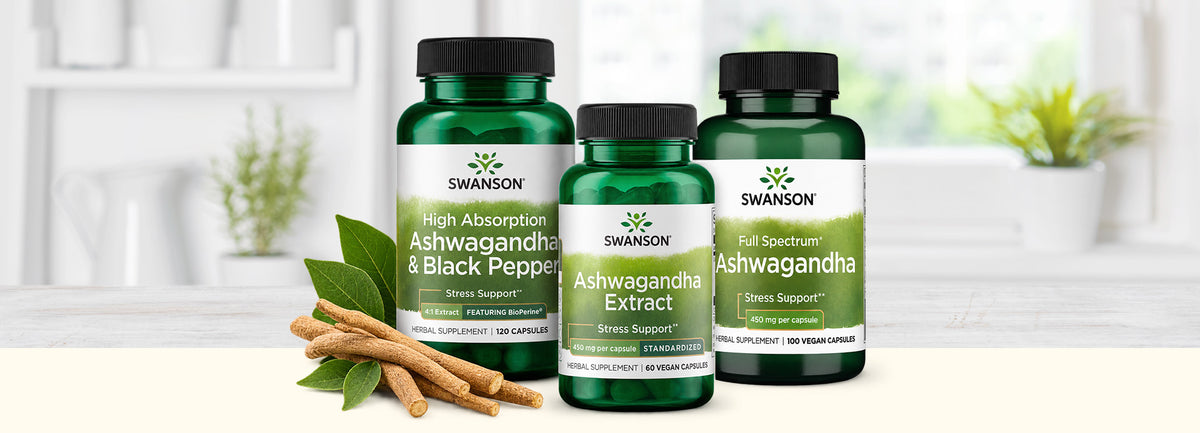 Three Swanson ashwagandha supplements—High Absorption Ashwagandha & Black Pepper, Ashwagandha Extract, and Full Spectrum Ashwagandha—displayed beside ashwagandha roots and leaves.