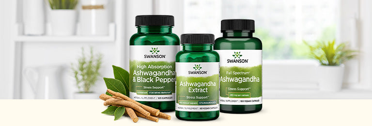 Three Swanson ashwagandha supplements—High Absorption Ashwagandha & Black Pepper, Ashwagandha Extract, and Full Spectrum Ashwagandha—displayed beside ashwagandha roots and leaves.