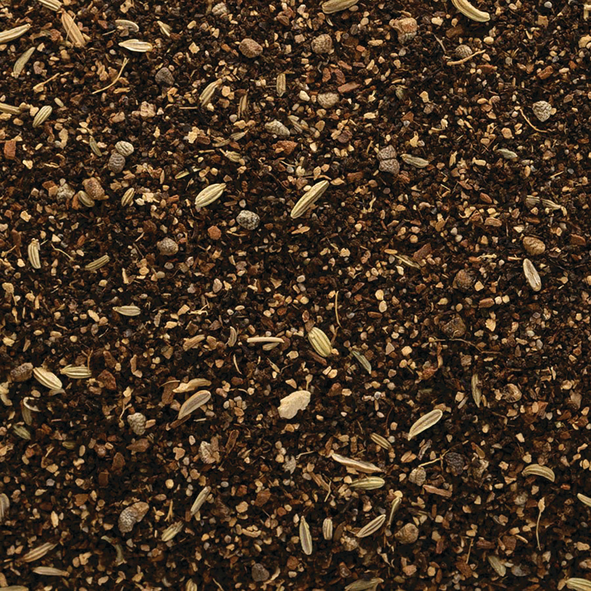 FNP029 | close-up of loose herbal seasoning with fennel seeds and crushed spices