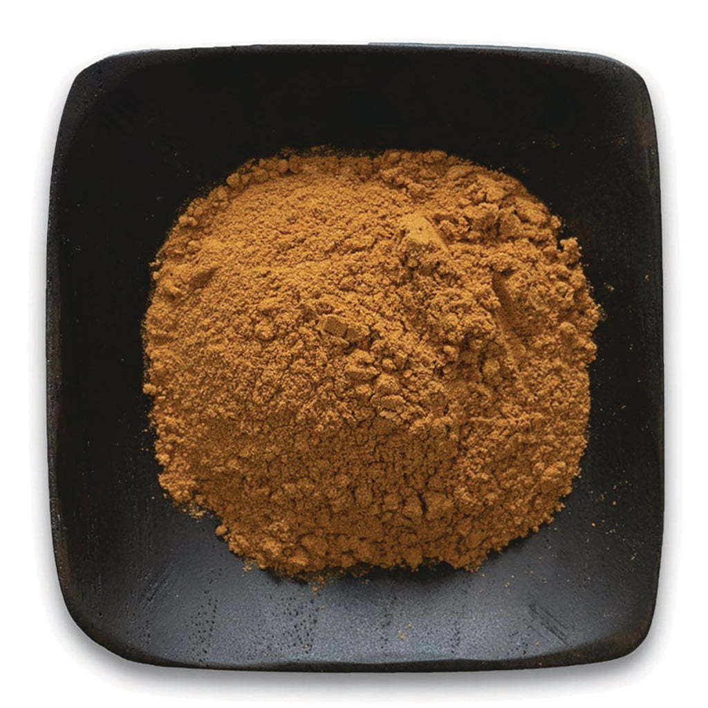 FNP022 | Heap of brown powder on square black dish, top-down view - Thumbnail