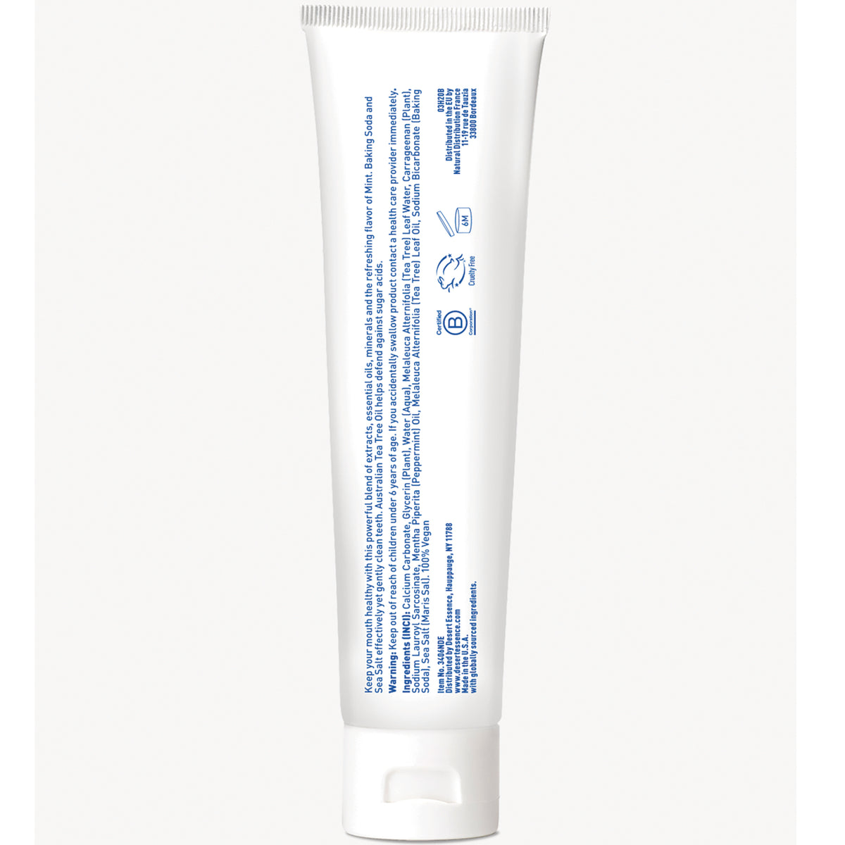 White tube back showing vertical blue ingredient and directions text and a white flip-top cap