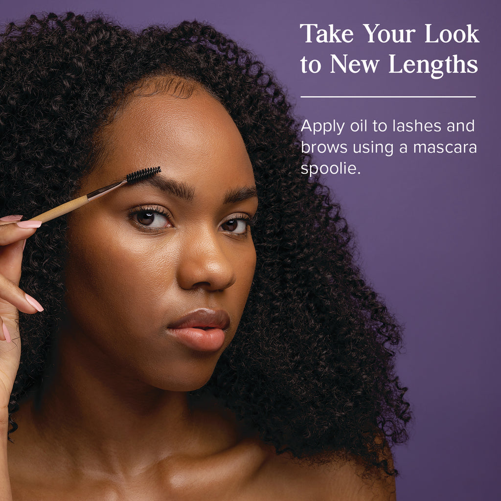 HTG011 | Woman using a mascara spoolie on her eyebrow against a purple background with text Take Your Look to New Lengths - Thumbnail