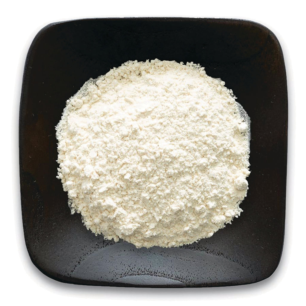 FNP074 | white powder on a dark square plate, top-down view - Thumbnail