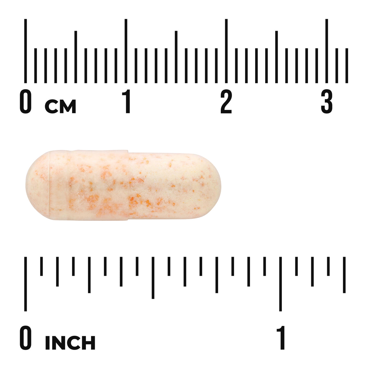 SW761 | Beige capsule with orange specks shown with cm and inch rulers for size