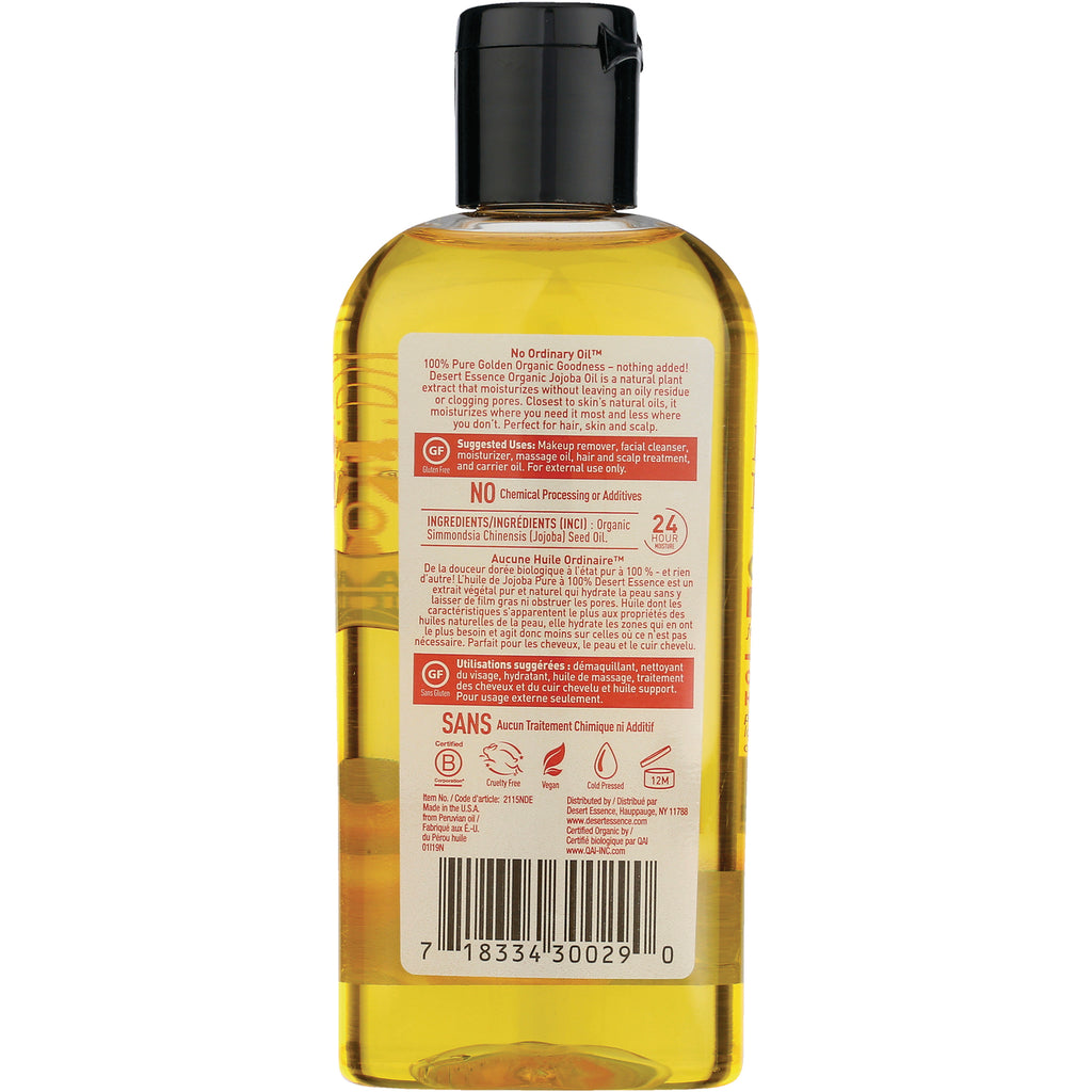 DST075 | Back label of clear bottle of golden oil showing ingredients, usage icons and barcode - Thumbnail