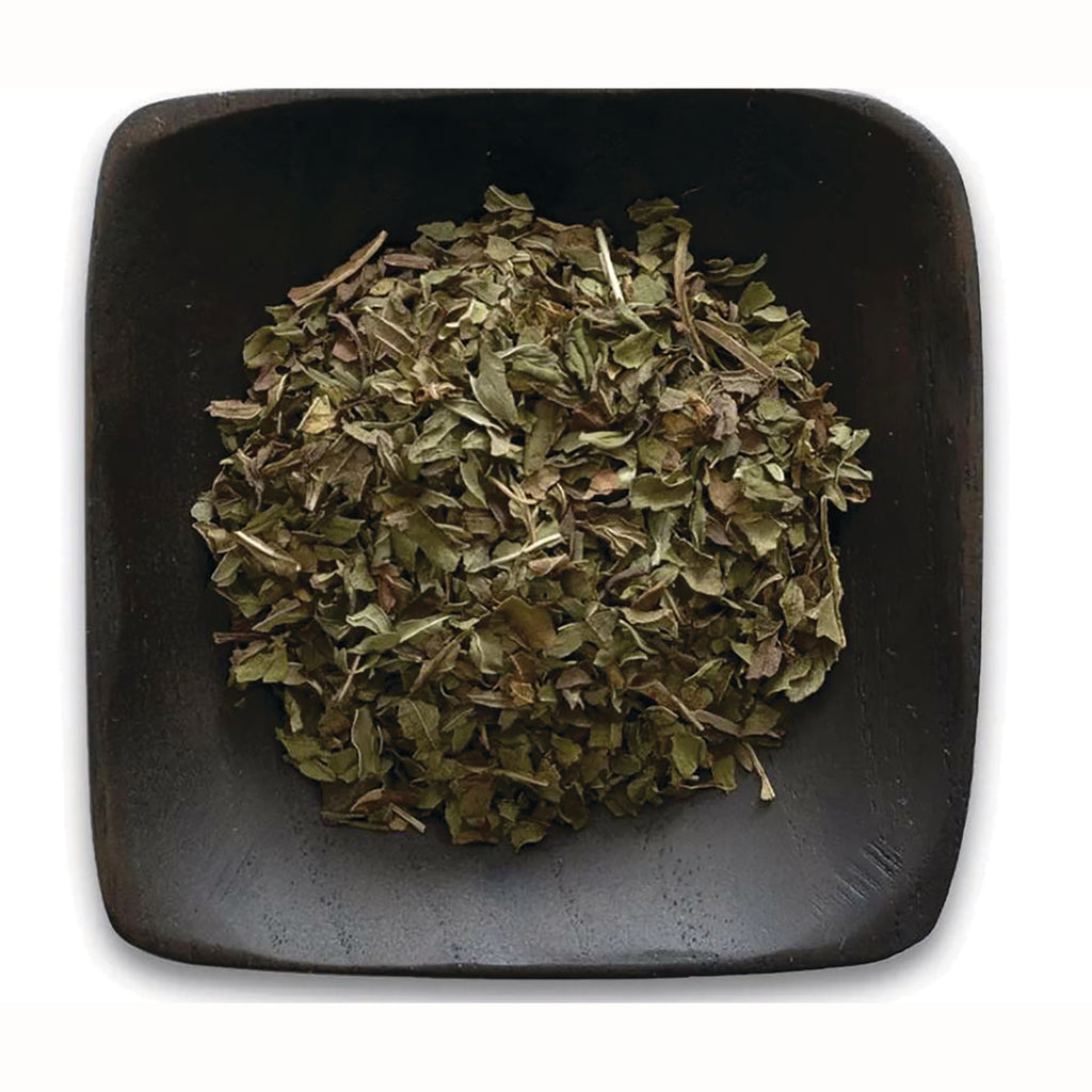 FNP387 | loose dried green herb leaves in a shallow square dark wooden bowl - Thumbnail
