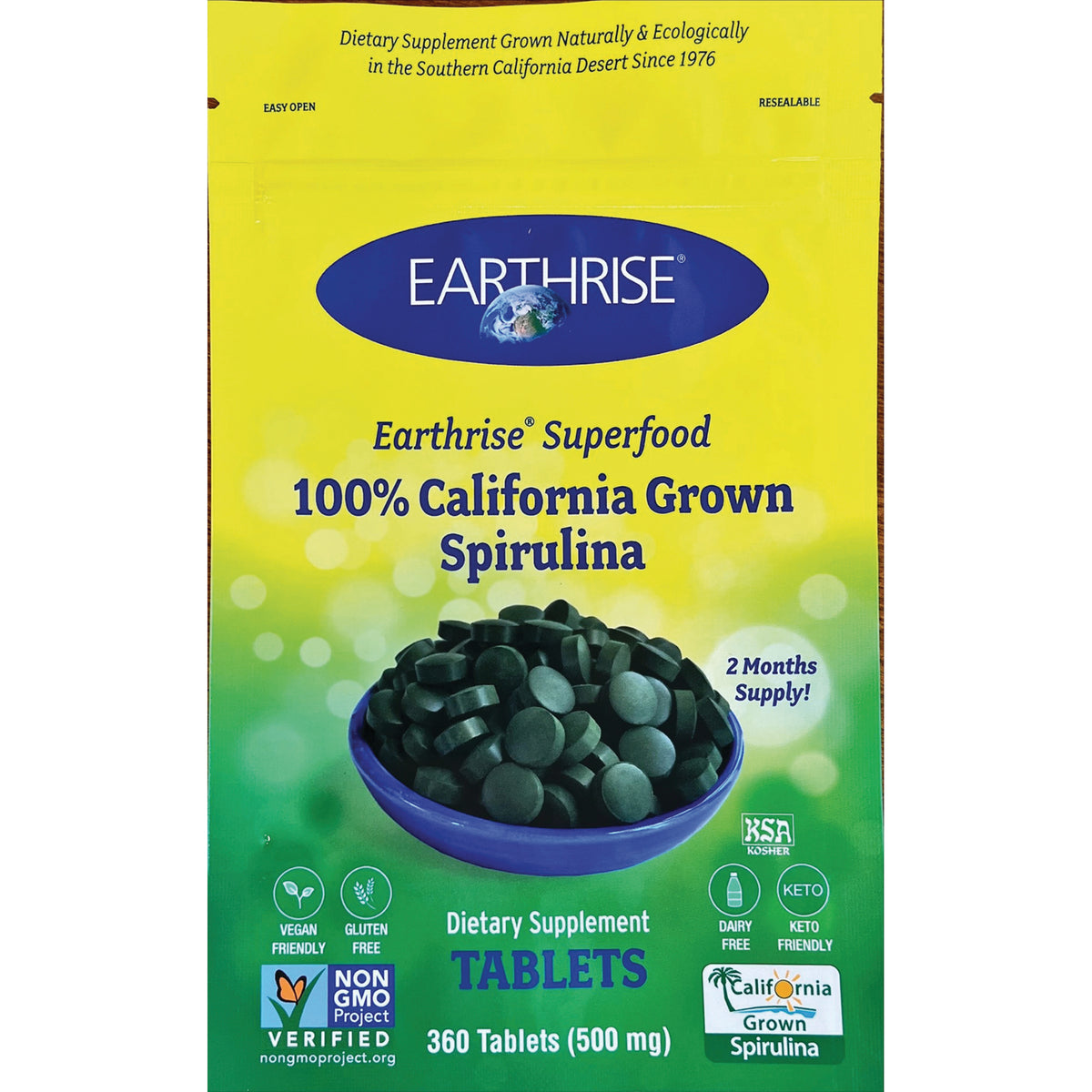 ER057 | Earthrise 100% California Grown Spirulina tablets packaging with bowl of dark green tablets, 360 tablets (500 mg)