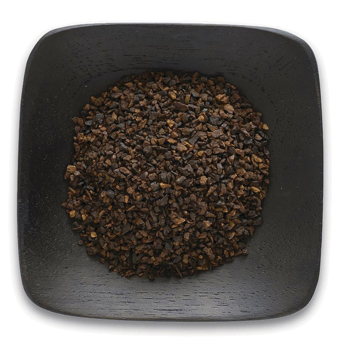 FNP385 | top-down view of coarse dark brown granules in a square black wooden bowl