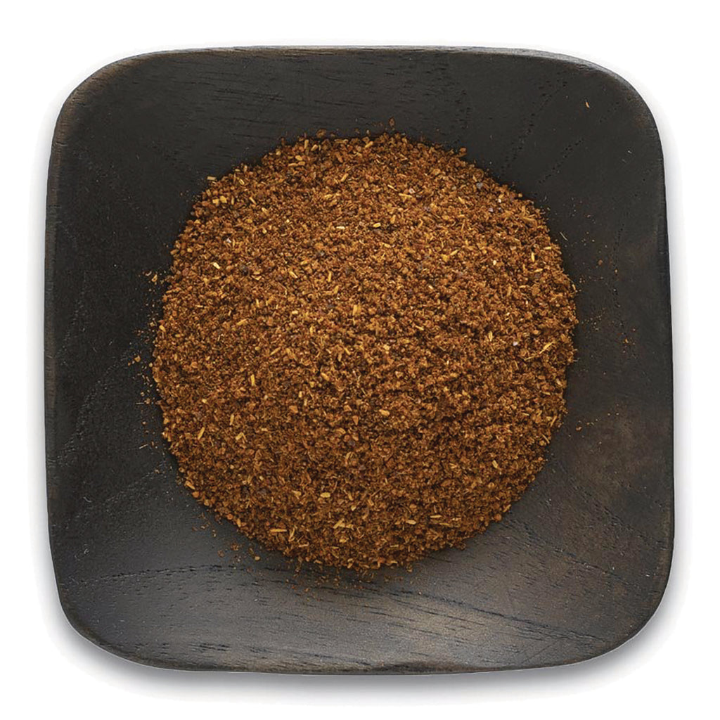 FNP033 | ground brown spice piled on a square dark wooden dish - Thumbnail
