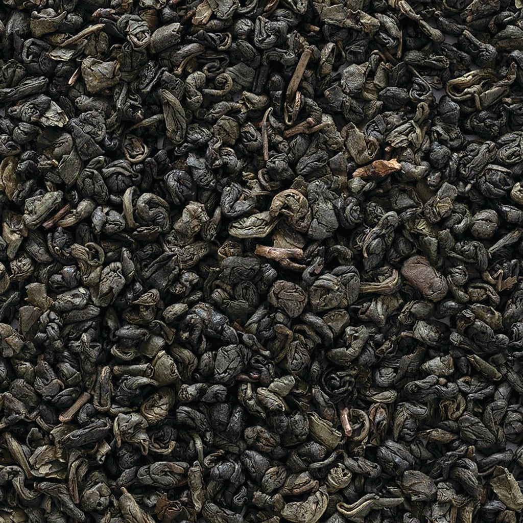 FNP031 | close-up of rolled loose green tea leaves with dark green curled leaves and small stems - Thumbnail