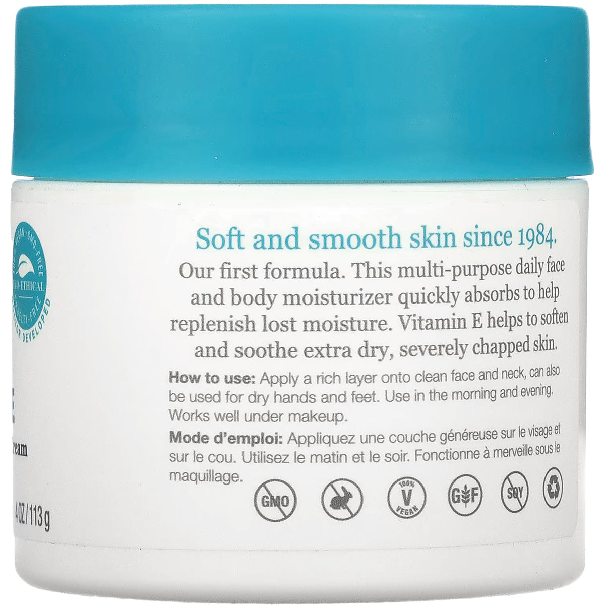 DE006 | Back label of white jar with teal lid reading Soft and smooth skin since 1984, usage instructions and certification icons