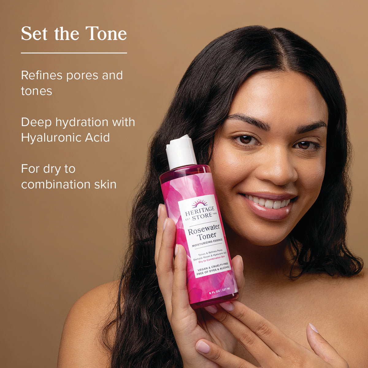 HTG118 | Woman holding Heritage Store Rosewater Toner bottle, smiling with product benefit text at left