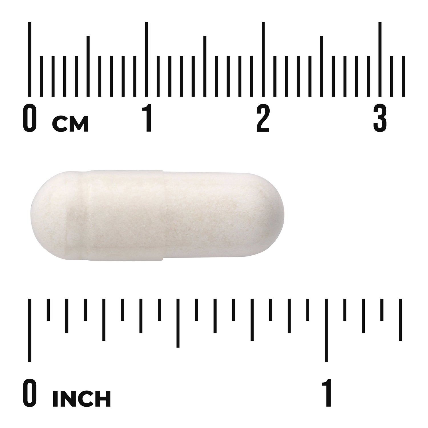 SWU725 | White capsule next to centimeter and inch rulers, labeled 0 CM and 0 INCH