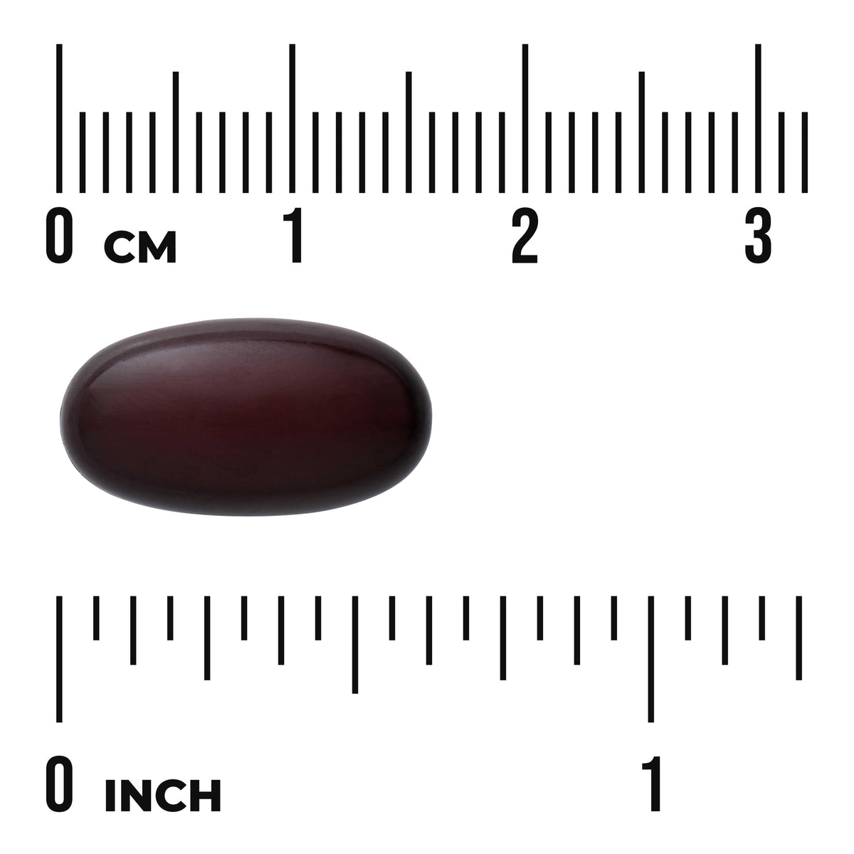 SWU1069 | Dark brown oval softgel beside rulers showing size in centimeters and inches